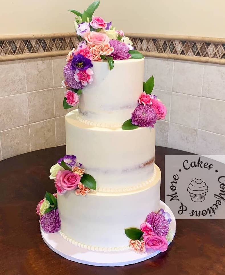 Decorate your cake with real, fresh flowers instead of sugar flowers! This will actually be way cheaper than doing frosting-based or edible decorations! Try to choose in-season flowers.