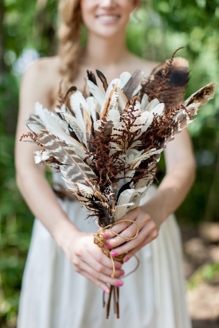 Feathers are fun, flirty, and add natural movement to the day. You’ll be able to sway around with your feather bouquet and it will swing back
