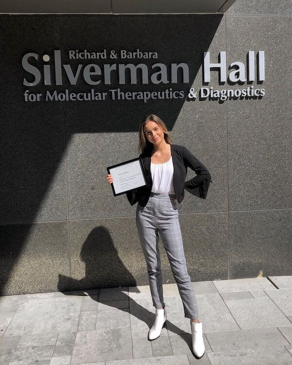 Olivia Pura, receiving her BA in Biochemistry