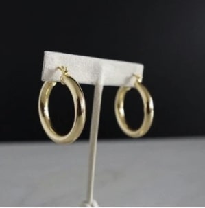 Hoop earrings and simple gold jewelry look great for sorority events