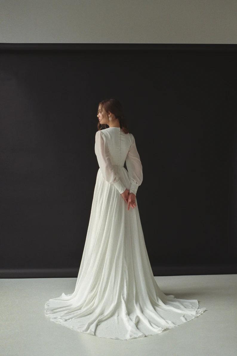 Size 8 Long Sleeve White Ball Gown on Queenly