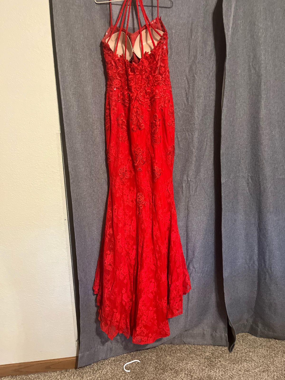 Yes its hemmed Size 4 Prom Red Side Slit Dress on Queenly