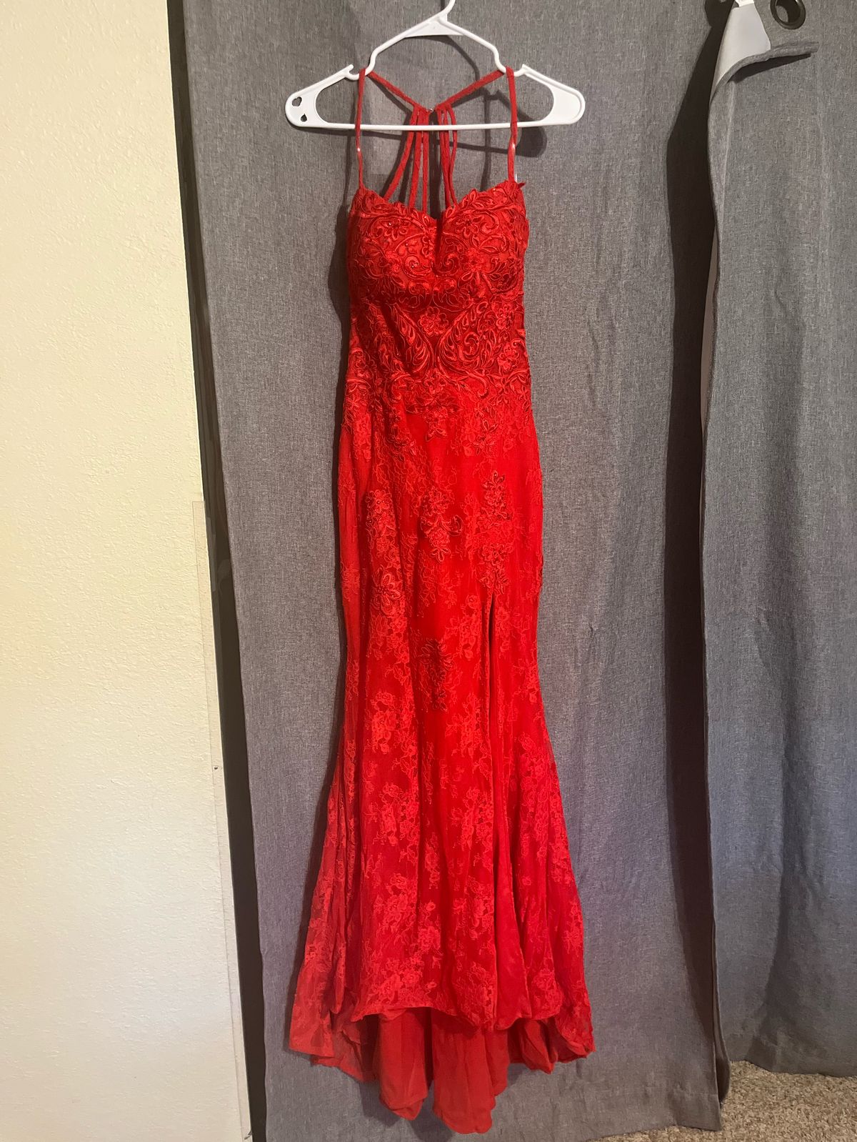 Yes its hemmed Size 4 Prom Red Side Slit Dress on Queenly
