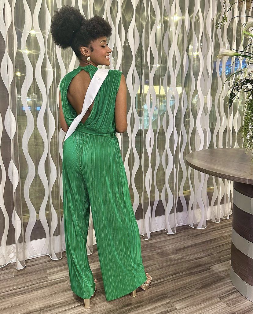 Size M Pageant High Neck Green Formal Jumpsuit on Queenly