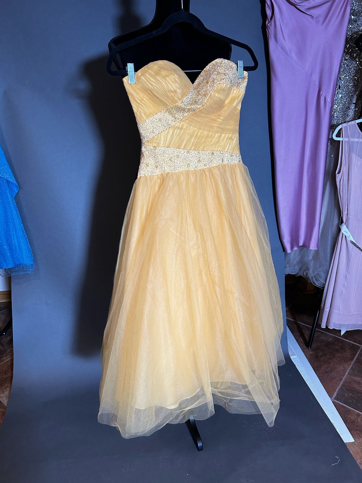 Queenly | Buy and sell prom, pageant, and formal dresses