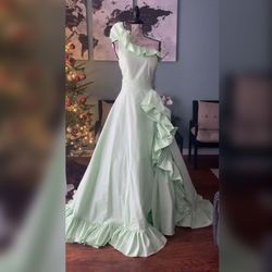 Jovani Light Green Size 12 Black Tie Ball gown on Queenly