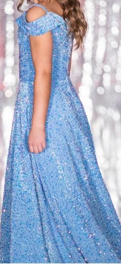 Jovani, MacDuggal, Sherri Hill, Tony Bowls, La Femme- Pageant Resale | This  dress is a white silky heartline ballroom dress with a blue gem leaf at the  side which gives that elegant