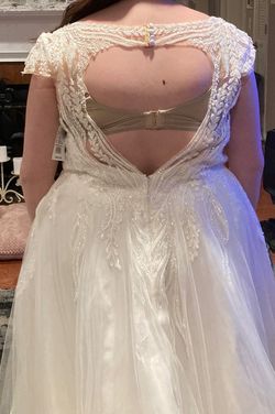 Style V10003 N/S Ivory with Cathedral Matching Veil priced at $279.00 Oleg Cassini White Size 18 Jersey Jewelled Plus Size A-line Dress on Queenly