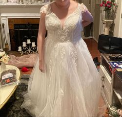 Style V10003 N/S Ivory with Cathedral Matching Veil priced at $279.00 Oleg Cassini White Size 18 Jewelled Plus Size Free Shipping A-line Dress on Queenly