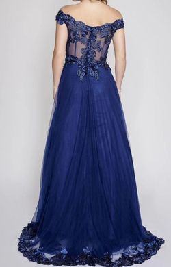 Style 2369 Nina Canacci Blue Size 10 Embroidery Pageant Floor Length Jersey Ball gown on Queenly